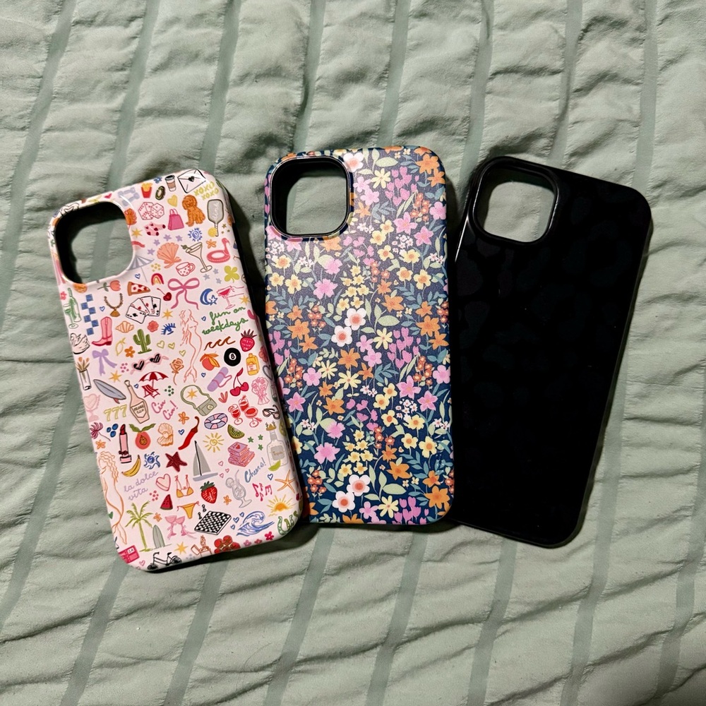 3 IPhone 15 plus cases - 2 casely, 1 target cheetah print